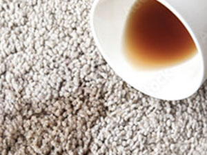 coffee spilling on carpet