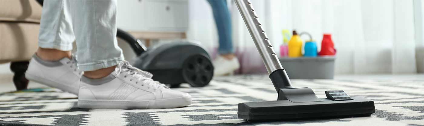 Vacuuming carpet at home